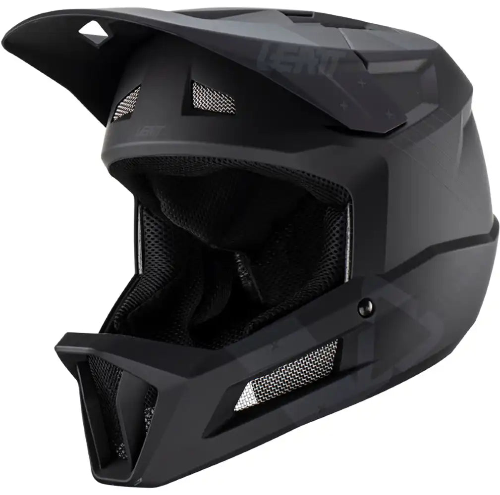 Leatt Gravity 2.0 full face helmet with black and white design, padded interior, and adjustable straps for mountain biking safety.