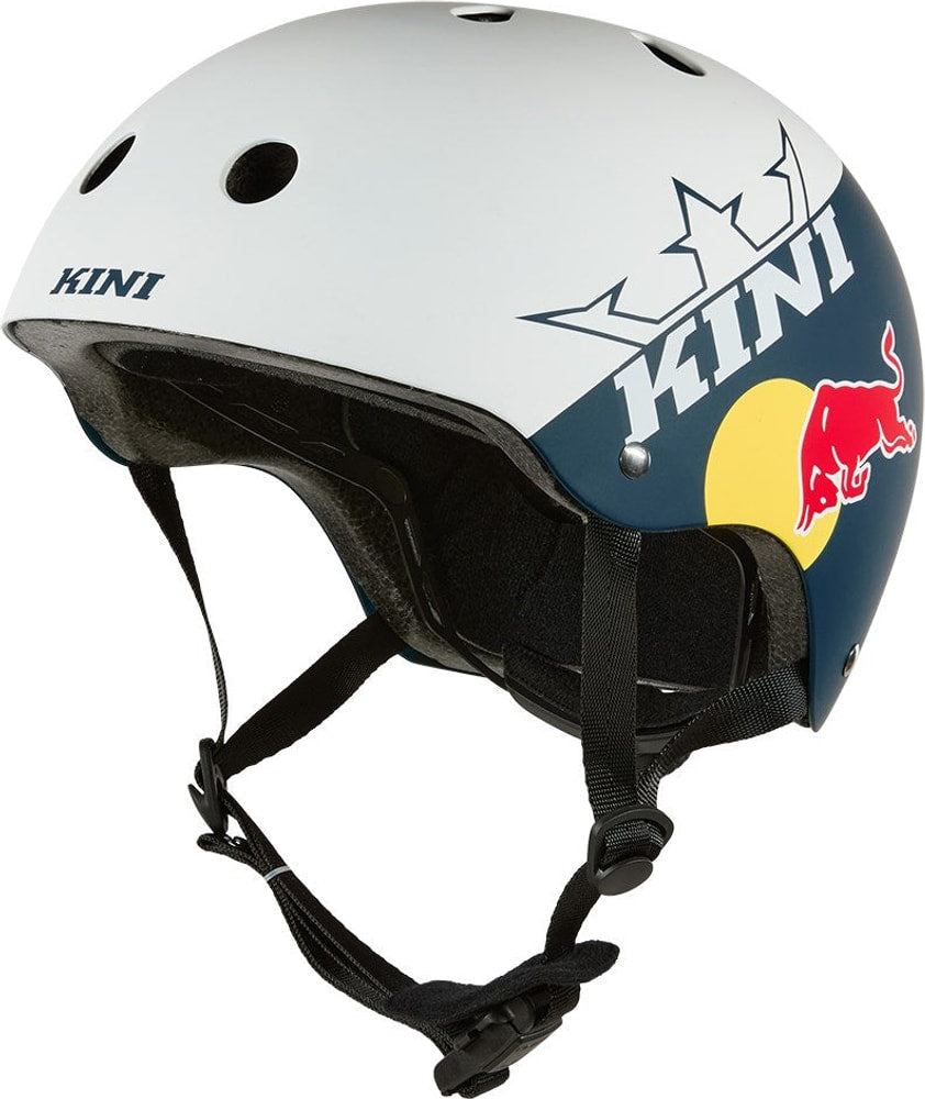 Kini Red Bull BB 1.0 BMX helmet with red and black design, featuring ventilation holes and adjustable straps.