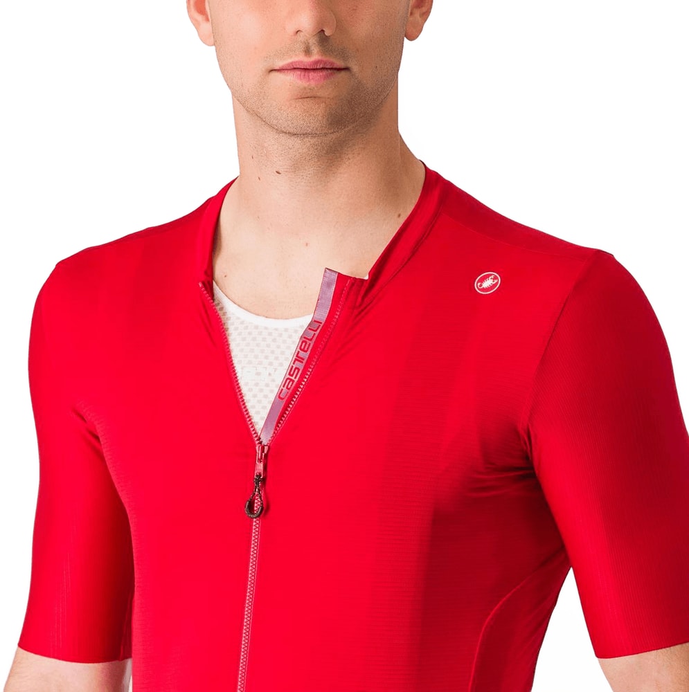 Castelli Espresso SS men's cycling jersey in blue with short sleeves and front zipper, lying flat on a white background.