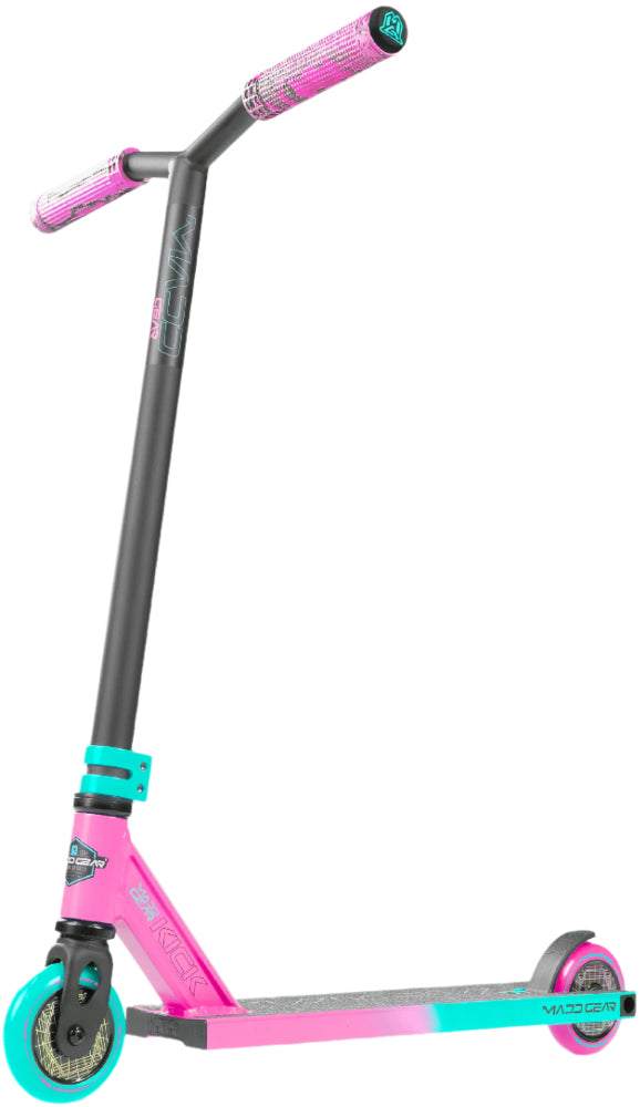 MGP Kick Pro X scooter in pink and teal with sturdy deck and handlebars, designed for stunt riding and tricks.