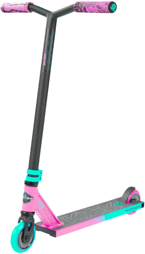 MGP Kick Pro X scooter with pink and teal deck, handlebar grips, and sturdy wheels, designed for freestyle skating.