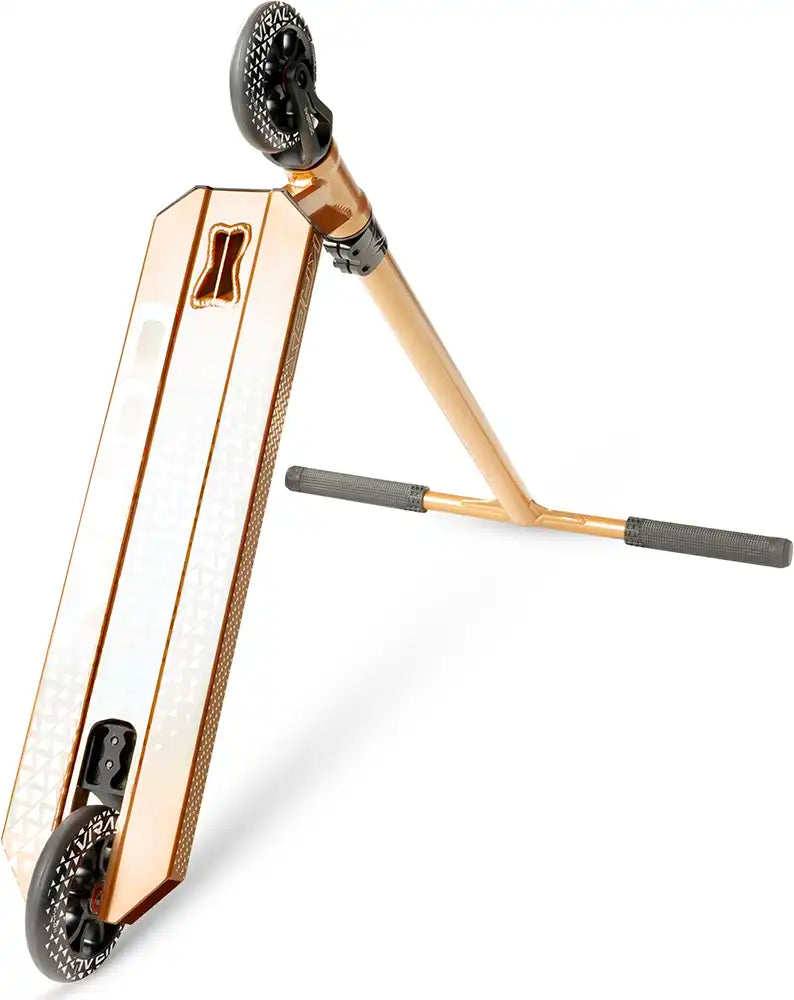 MGP Viral Kaos Scooter with copper-colored deck, viewed from underside showing deck design and scooter components.