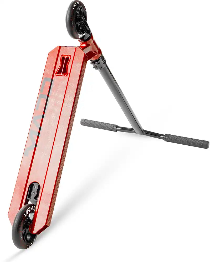 MGP Viral Purge scooter in cherry color, side view showing deck, wheels, and handlebar for kids and teens riding scooters.