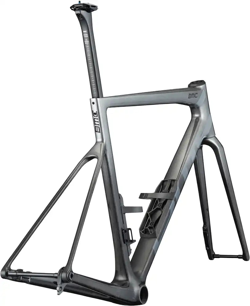 BMC Teammachine SLR 01 road bike frameset in black and red with aerodynamic design and lightweight carbon construction.
