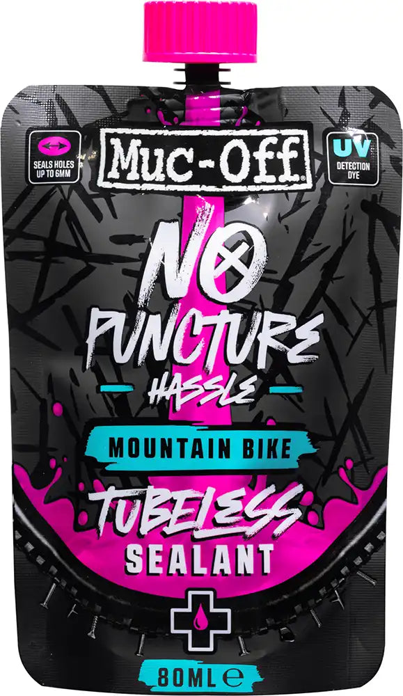 Muc-Off No Puncture MTB tubeless sealant bottle, cycling accessories for mountain bike tire puncture prevention, black and white label