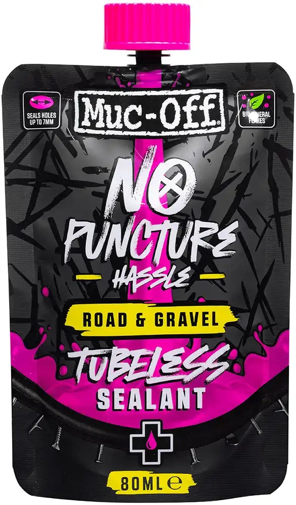 Muc-Off No Puncture Road and Gravel Tubeless Sealant in a clear bottle, cycling accessories for puncture prevention