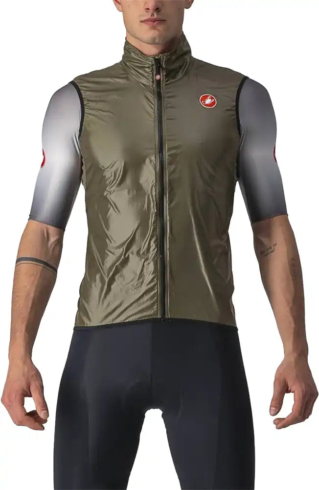 Castelli Aria men's cycling vest in lightweight, breathable fabric, shown on a hanger with front zipper and reflective accents.