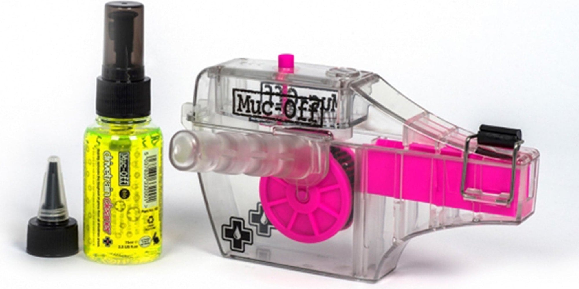 Muc-Off X-3 Dirty Chain Machine for cleaning bicycle chains, shown in a close-up view with its parts visible.