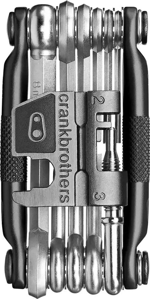 Crankbrothers M17 multi tool with various hex and screwdriver bits, compact accessories for bike repair and maintenance.
