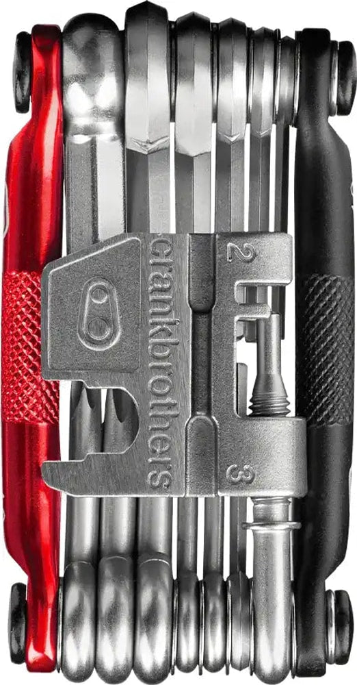 Crankbrothers M19 multi-tool for bike repairs with multiple screwdriver and wrench functions, compact design for cycling accessories.