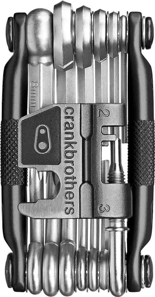 Crankbrothers M19 multi tool with various hex and Torx bits, compact accessories for bike repair and maintenance.
