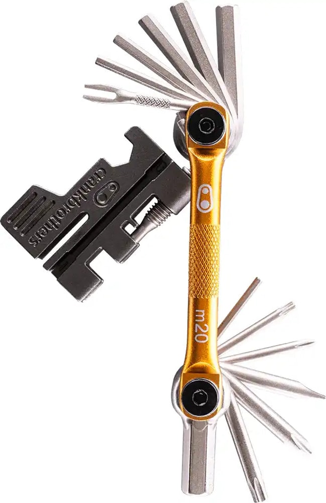 Crankbrothers M20 multi-tool with various Allen wrenches, screwdrivers, and other bike repair accessories on a black background.