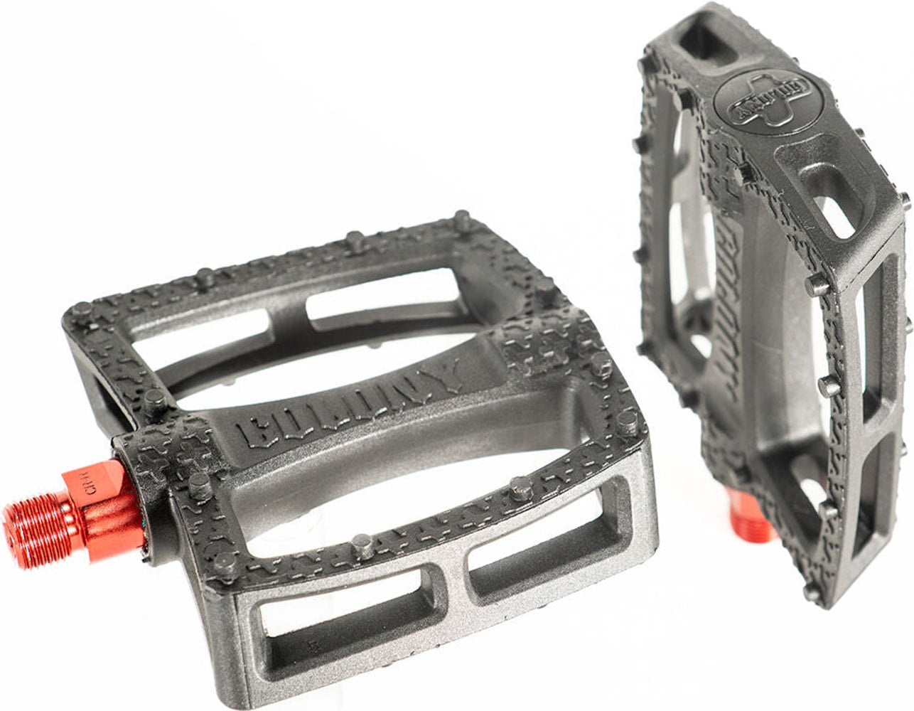 Colony Fantastic BMX pedals, black metal bike parts with textured grip surfaces for BMX riding, close-up view.