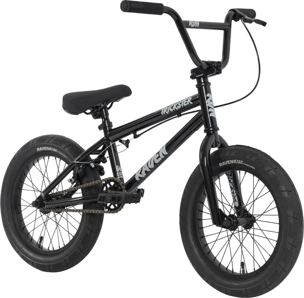 Raven Trickster 16 BMX bike with black frame and colorful graphics, suitable for kids and young riders.