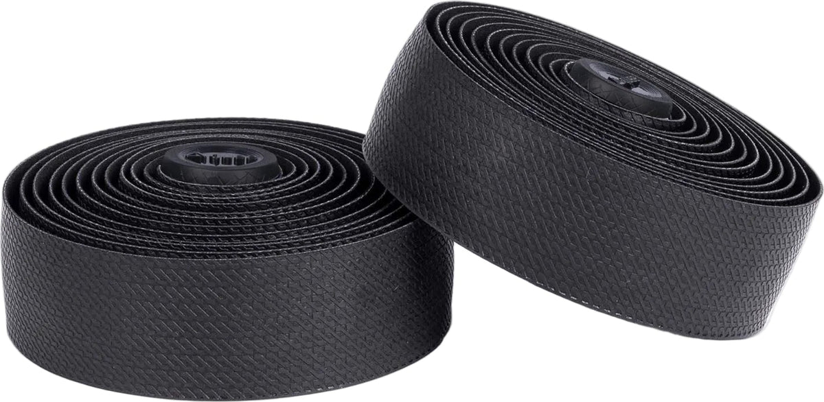 Guee SL One handlebar tape for bike accessories, black textured grip with branding, wrapped around bicycle handlebars.