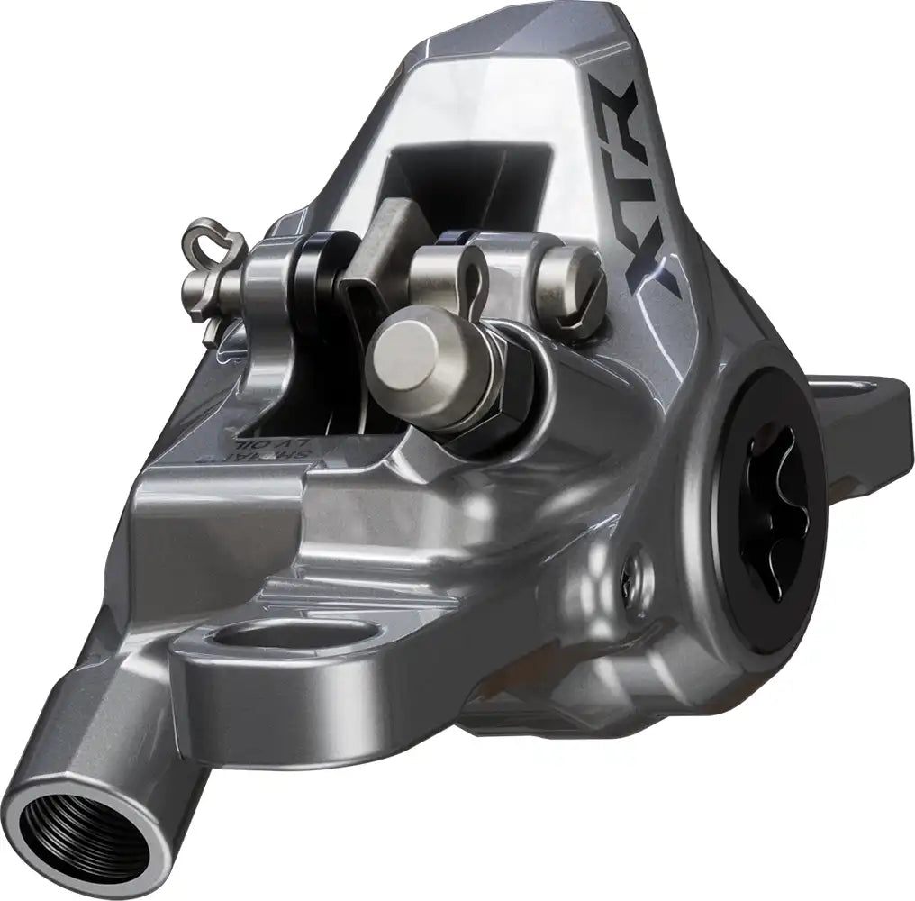 Shimano XTR XC M9200 hydraulic disc brake caliper for mountain biking, featuring sleek black design and mounting hardware.
