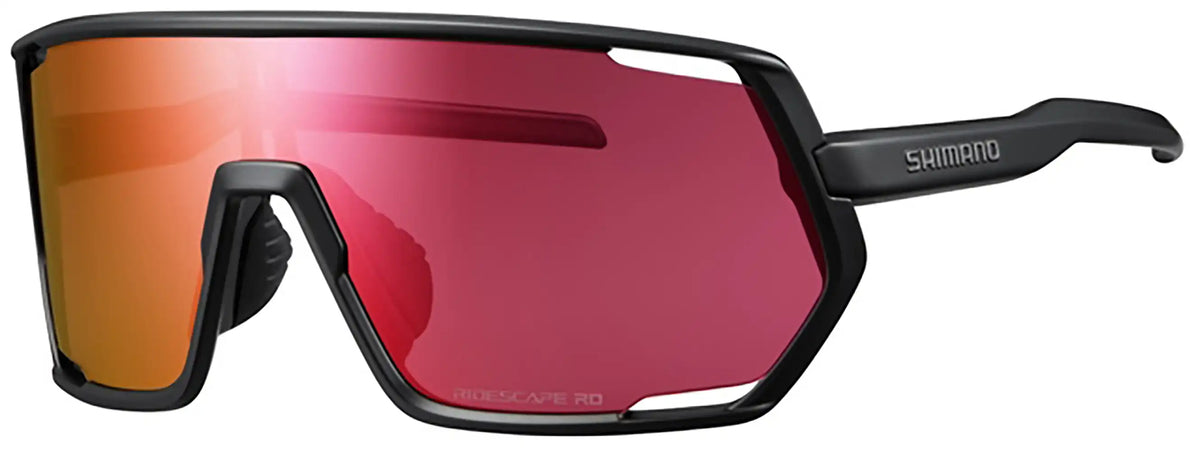 Shimano Technium glasses accessory with red frame and clear lenses, designed for outdoor activities and cycling.
