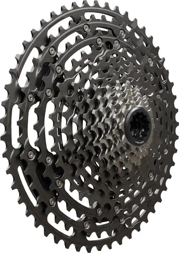 Shimano XTR M9200 12-speed cassette with 10-51T gear range, close-up of the black alloy sprockets and gear teeth.