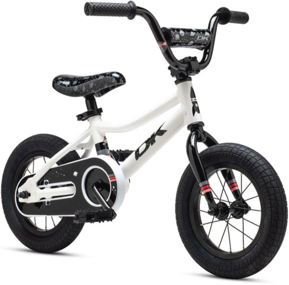 Bright yellow DK Devo 12 kids' bike with sturdy frame and colorful design, perfect for young riders.