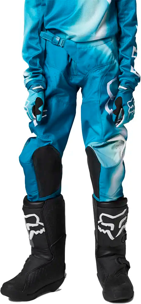 Fox 180 TOXSYK youth girls' moto pants shown in black, featuring protective knee pads and durable motocross gear design.