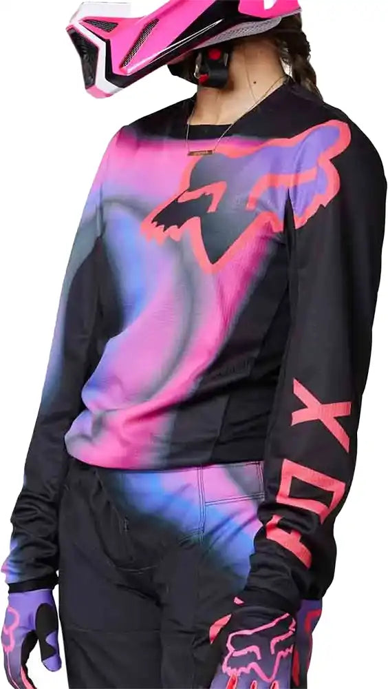 Fox 180 TOXSYK women's moto jersey, black and white, with Fox logo and protective padding, designed for motorcycle riding comfort.