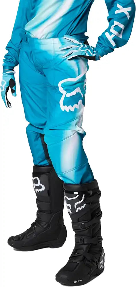 Fox 180 TOXSYK women's moto pants in black, made of durable textile with knee armor for motorcycle riding protection.