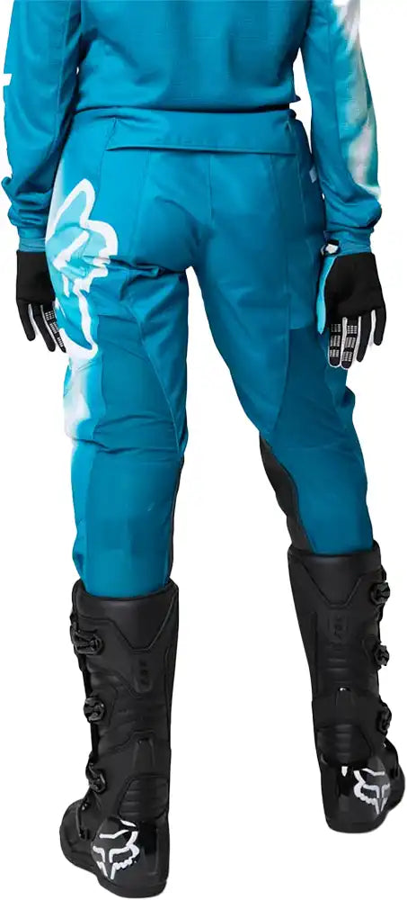 Fox 180 TOXSYK women's moto pants in black, featuring reinforced panels and a slim fit, designed for motorcycle riding.