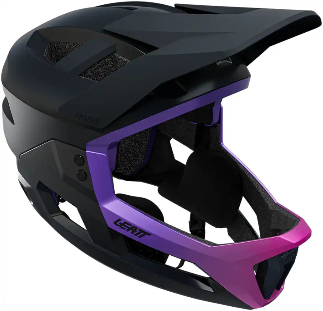 Leatt Enduro 3.0 full face helmet in cream, grey, and purple with ventilation and protective design for mountain biking.
