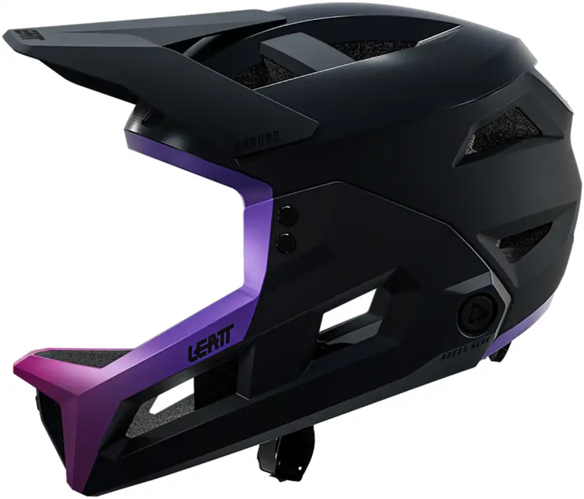 Leatt Enduro 3.0 full face helmet in cream, grey, and purple with aerodynamic vents and secure chin guard for mountain biking.
