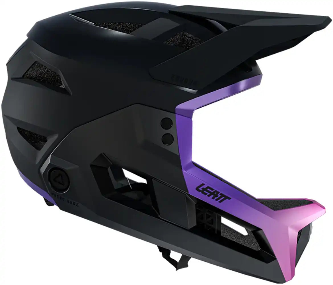 Leatt Enduro 3.0 full face helmet in cream, grey, and purple with ventilation and secure chin guard for mountain biking.