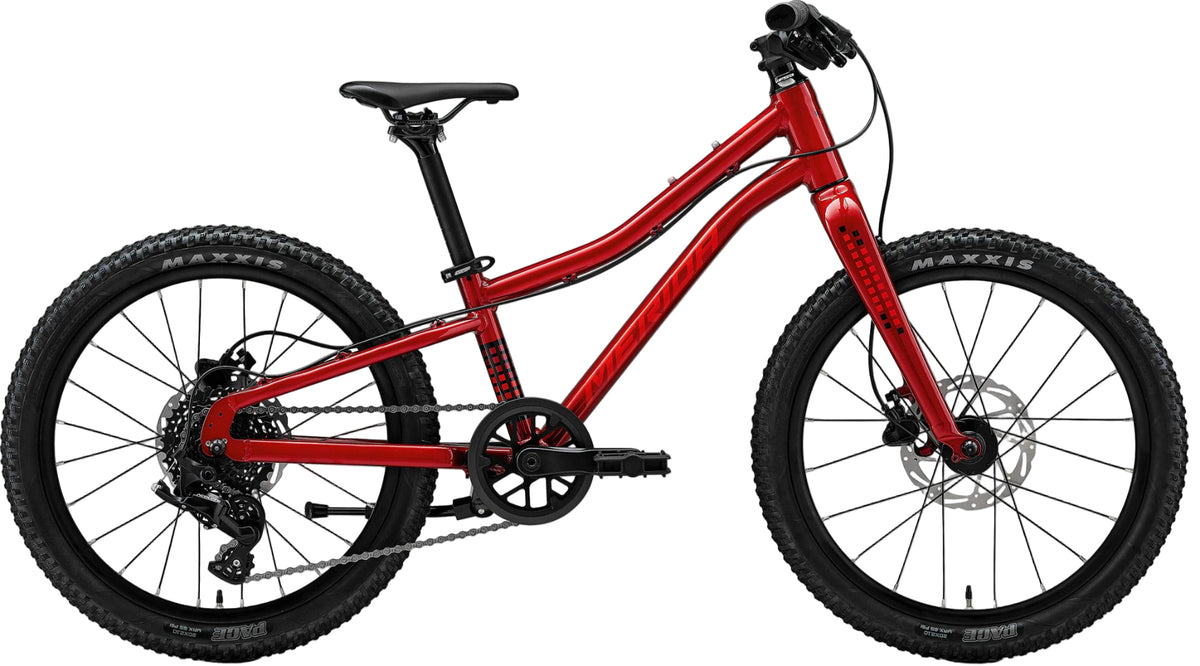 Kids Merida Matts J20+ bike with colorful frame and sturdy tires, designed for young riders and outdoor adventures.
