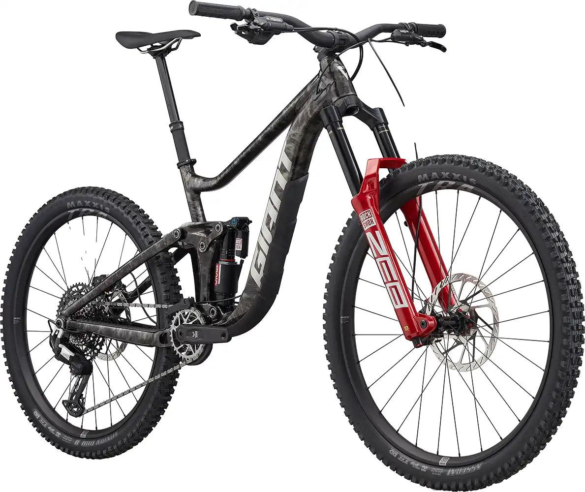 Front view of the 2026 Giant Reign SE dual suspension mountain bike with a vibrant color finish.