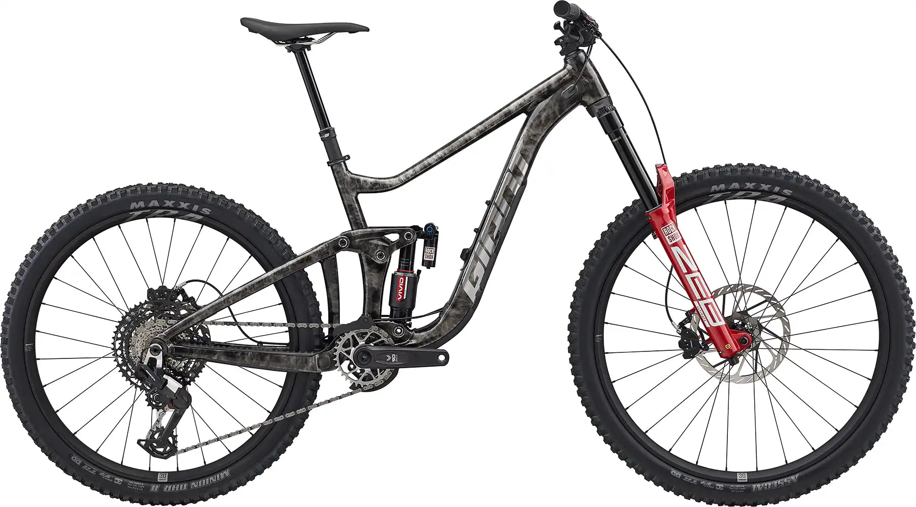 Giant 2026 Reign SE dual suspension mountain bike with blue frame and rugged tires, ready for off-road adventures.