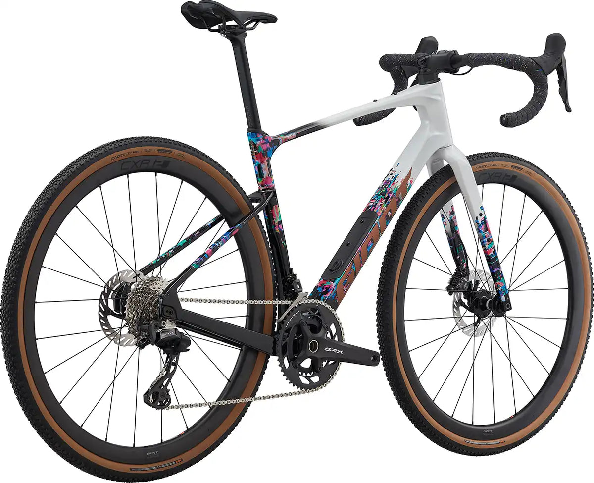 Rear view of the 2026 Giant Revolt Advanced 0 SE gravel bike in color A, showcasing its lightweight frame and rugged design.