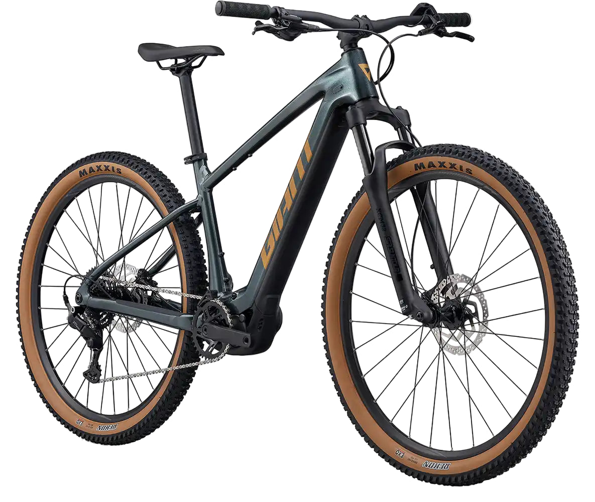 Giant 2026 Talon E+ electric mountain bike in asphalt green, front view showing frame and front wheel.