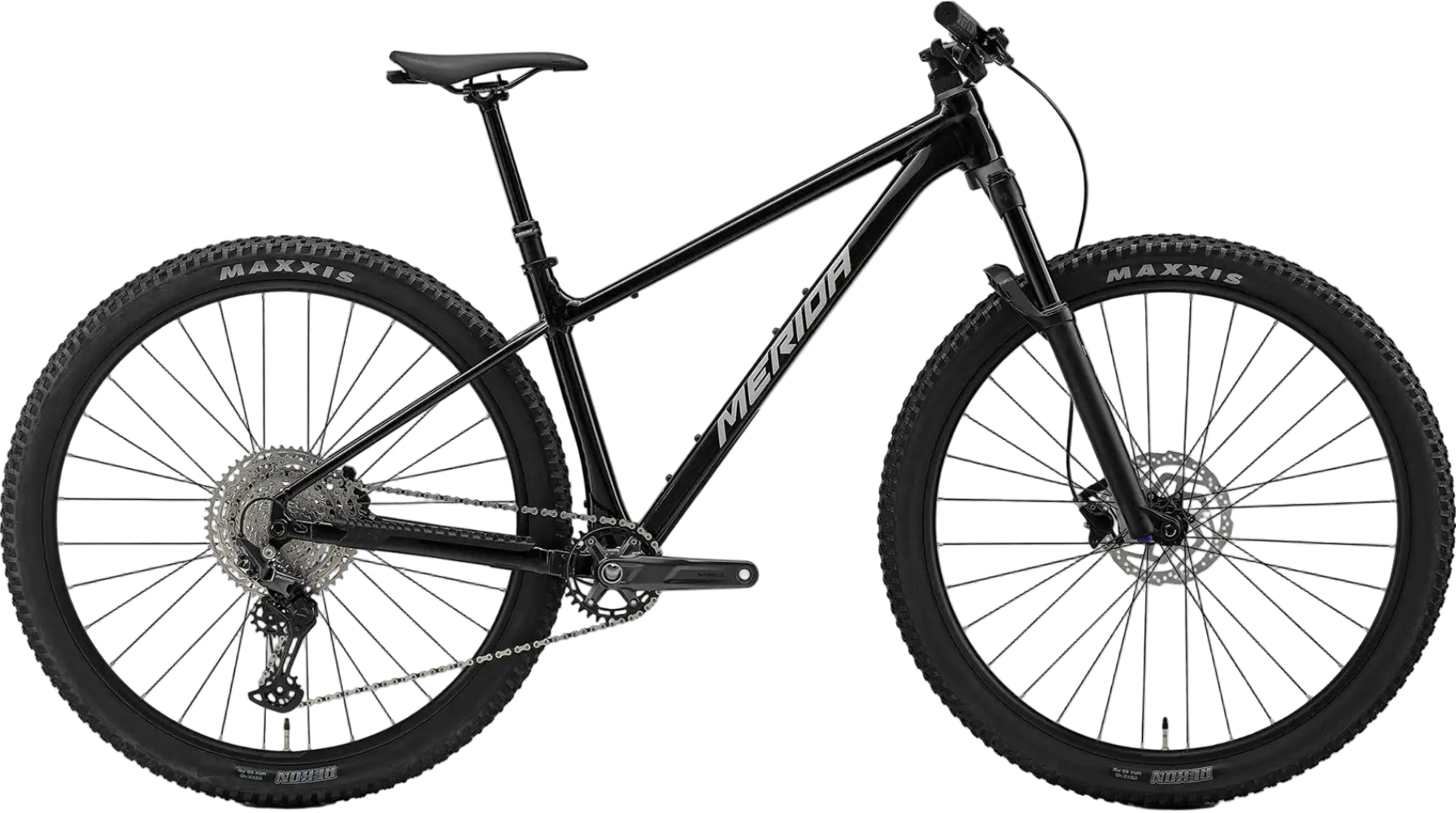 Merida Big Nine TR 700 hardtail mountain bike in metallic black and silver, featuring a lightweight frame and rugged tires.