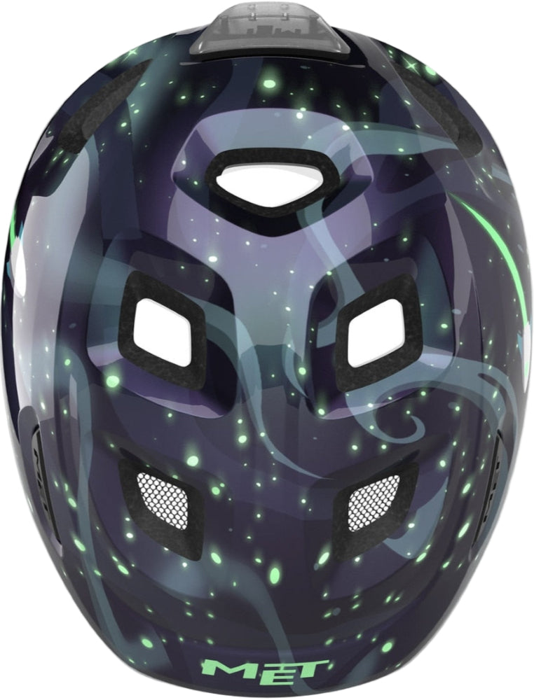 Black MET Hooray MIPS kids helmet with space glow-in-the-dark design, featuring ventilation vents and adjustable straps.