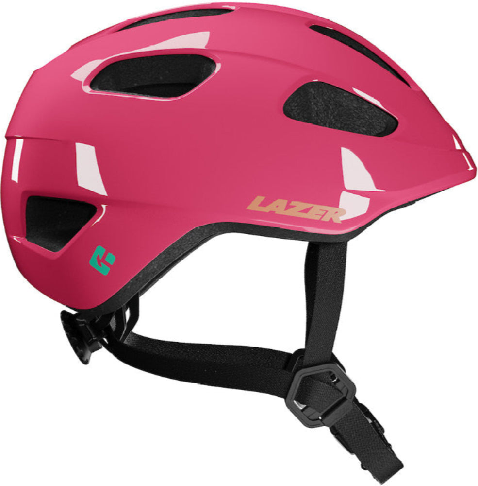Lazer Nutz KinetiCore kids helmet in fuchsia, shown from the right side, with adjustable strap and ventilation for safety.