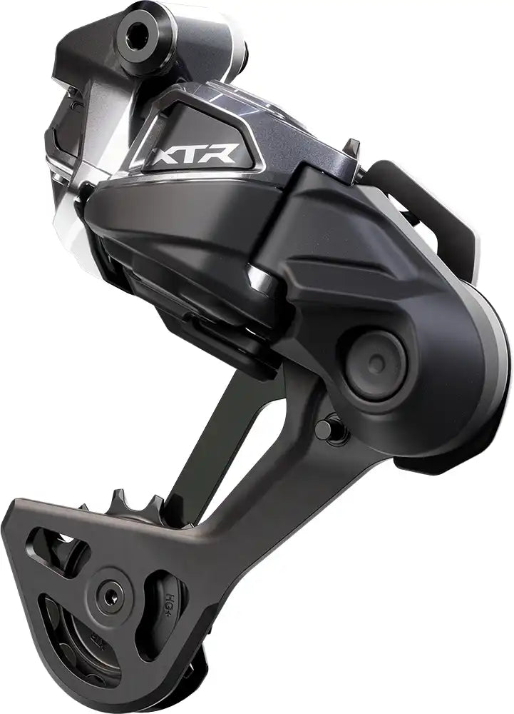 Shimano XTR Di2 M9250 12-speed rear derailleur showing the sleek black and silver design with adjustment screws and jockey wheels.