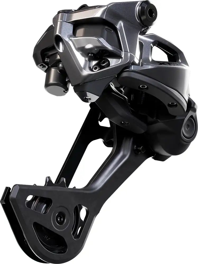 Shimano XTR Di2 M9260 12-speed eMTB rear derailleur, black and silver, mounted on bicycle drivetrain for mountain biking.