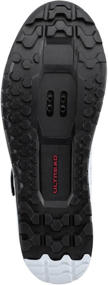 Shimano GE900 HS men's mountain bike shoes with black and gray design, featuring rugged soles and secure straps.