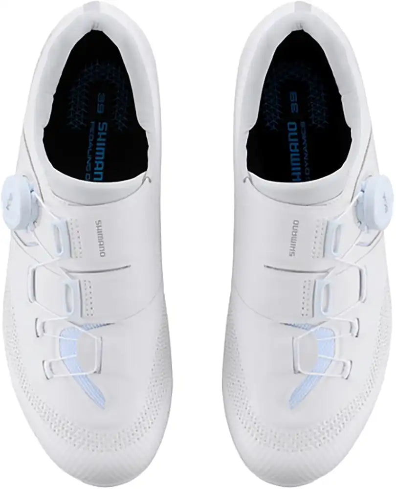 Shimano RC503 women's road cycling shoes with black and white design, featuring secure straps and breathable upper for comfort.
