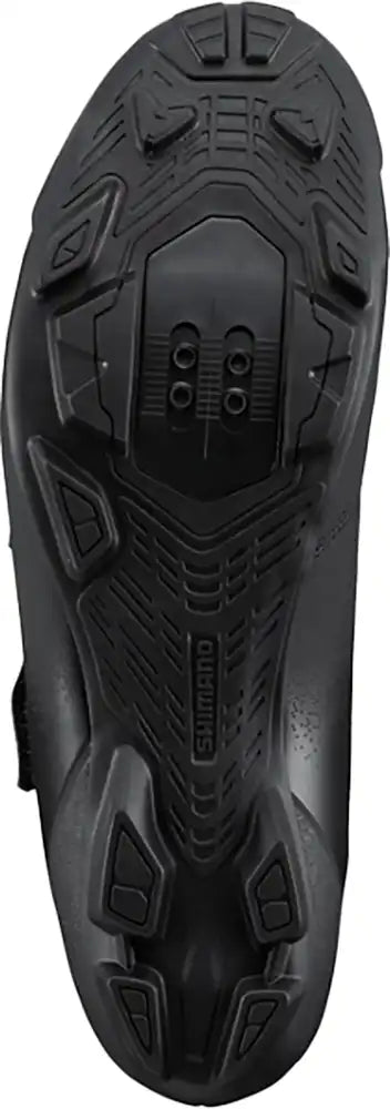 Shimano XC102 men's mountain biking shoes with black and gray design, featuring durable soles and secure fastening system.
