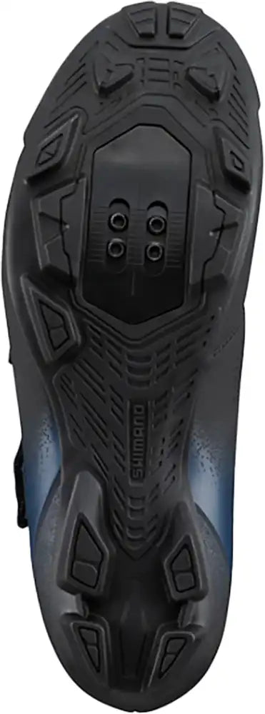 Shimano XC102 women's mountain bike shoes in black with Shimano branding and secure closure system, designed for off-road cycling.