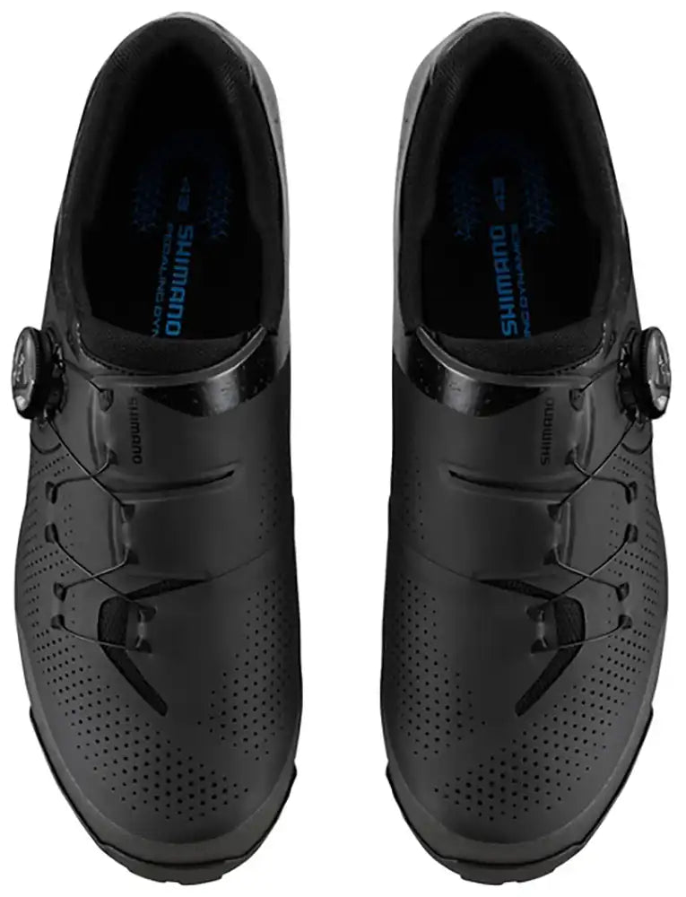 Shimano XC302 men's mountain bike shoes in black with a rugged sole and secure lacing system for off-road cycling.