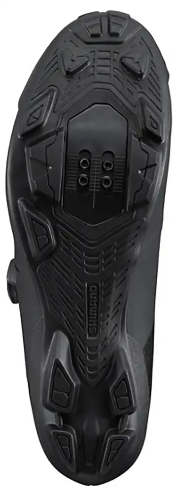 Shimano XC302 men's mountain biking shoes with black and gray design, featuring secure straps and rugged soles.