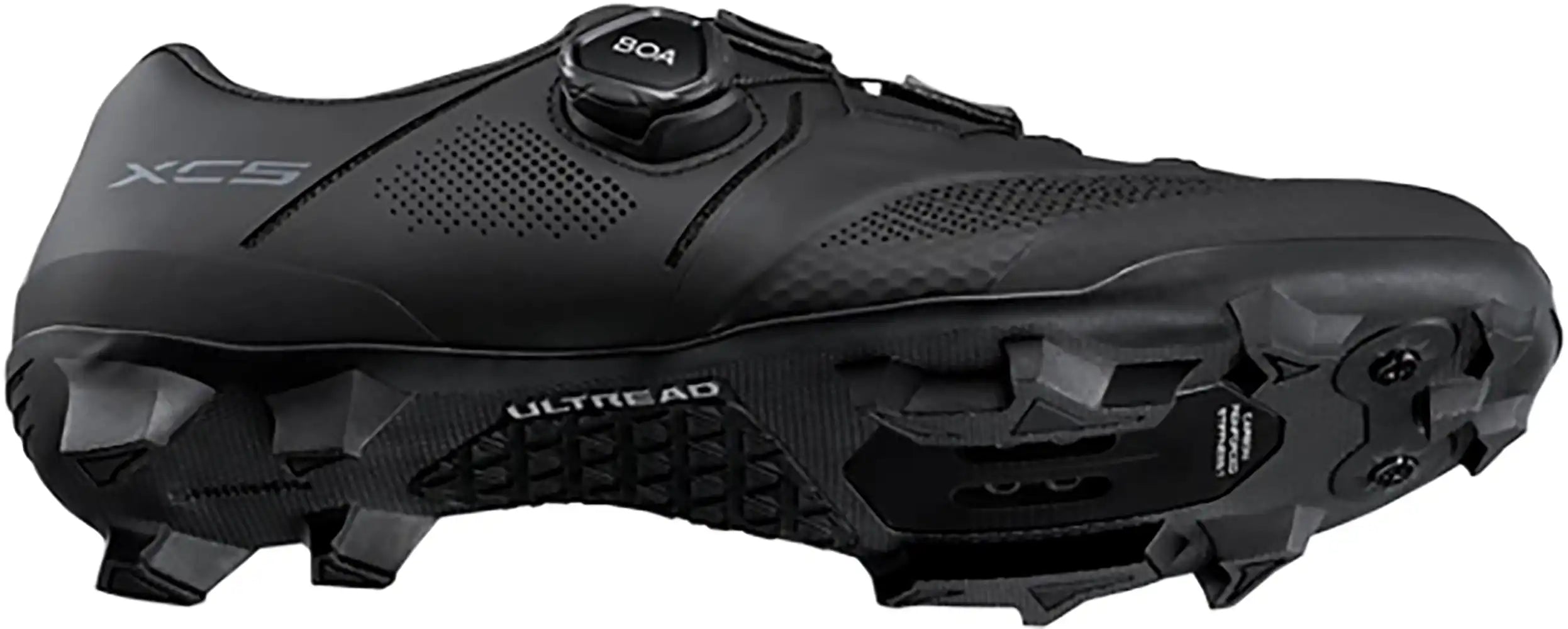 Shimano XC503 women's mountain biking shoes with black and white design, featuring rugged soles and secure fastening for off-road riding.