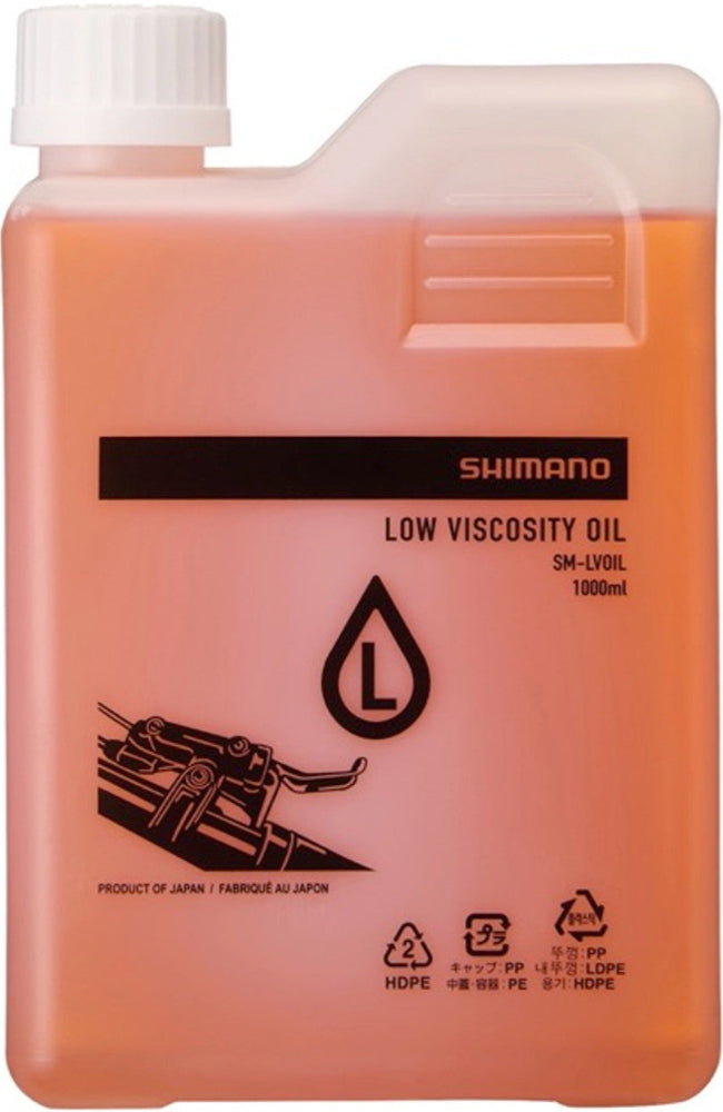 Shimano low viscosity mineral oil for bike disc brake parts, 500ml bottle with clear label and safety cap.