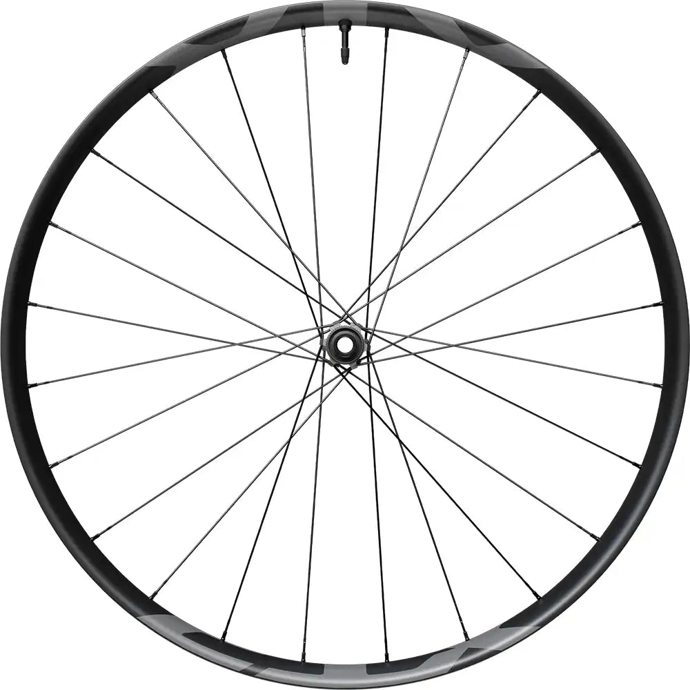 Shimano XTR XC M9200 carbon tubeless disc wheel for mountain biking, with black spokes and rim, mounted on a bike.