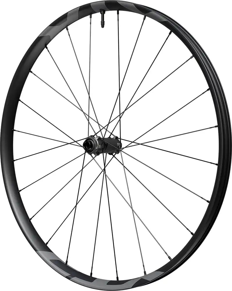 Shimano XTR XC M9200 carbon tubeless disc wheel for mountain biking, showing the black wheel with disc brake mount and rim details.